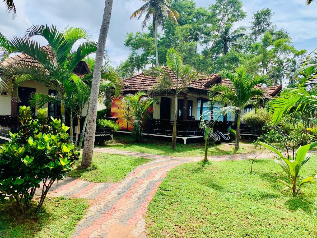 ורקלה Maadathil Cottages מראה חיצוני תמונה